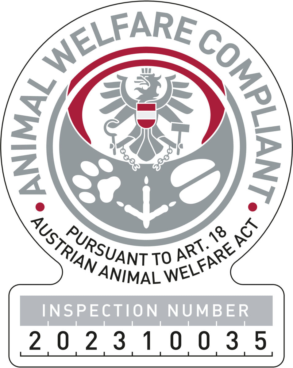 Graues und rotes Siegel mit Adler, Text "ANIMAL WELFARE COMPLIANT", "AUST. ANIMAL WELFARE ACT", Inspektionsnummer 202310035.