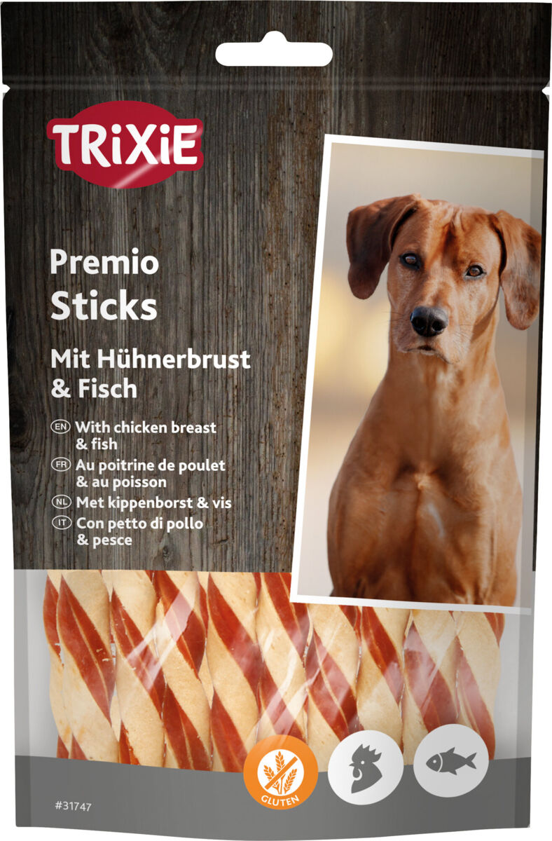 Die Verpackung zeigt Trixie Premio Sticks mit Hühnerbrust und Fisch, dekoriert mit einem Hundebild und Produktinformationen in mehreren Sprachen.