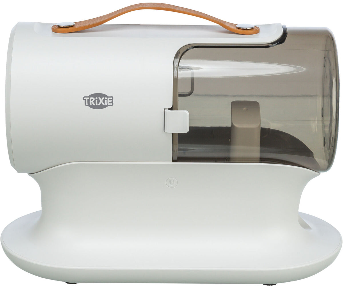 Weiß-graues, zylindrisches Objekt mit transparenter rechter Seite und braunem Tragegriff, Logo "TRIXIE".