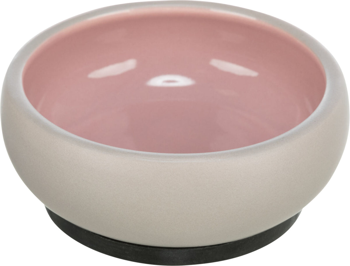 Runde Schale mit mattgrauer Außenseite und glänzend rosa Innenseite, schwarzer Boden.