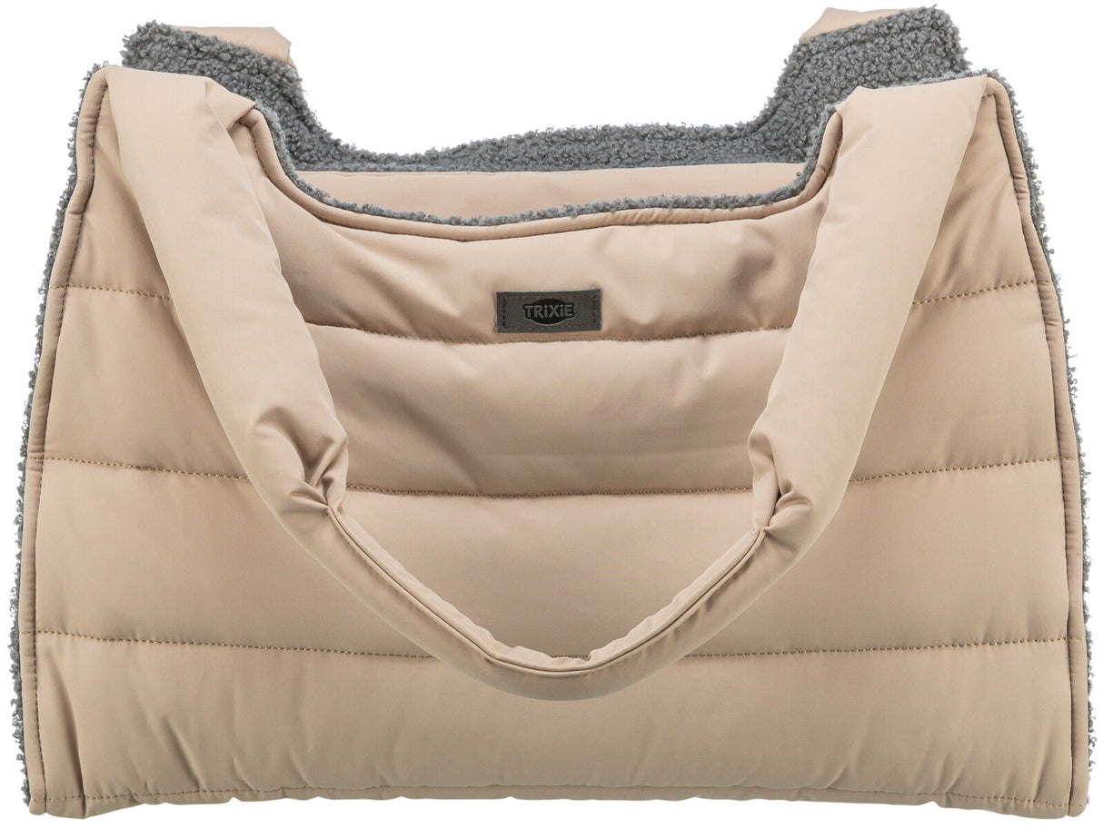 Beige Tragetasche mit gestepptem Design, weichem grauem Innenfutter und einem Etikett mit der Aufschrift "TRIXIE".