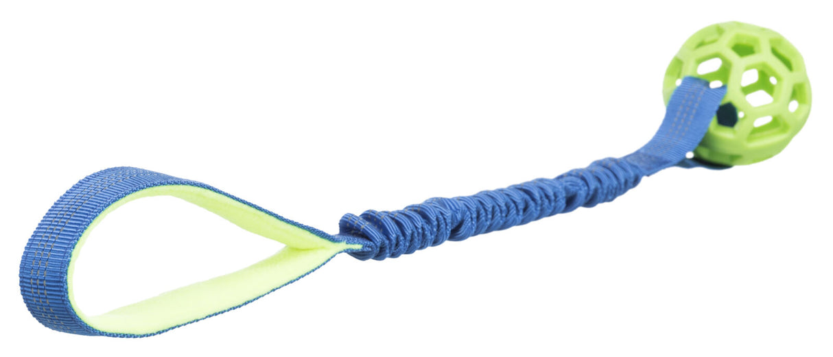 Grünes, gitterförmiges Spielzeug mit blauem Griffband und texturierter gelb-grüner Schlaufe.
