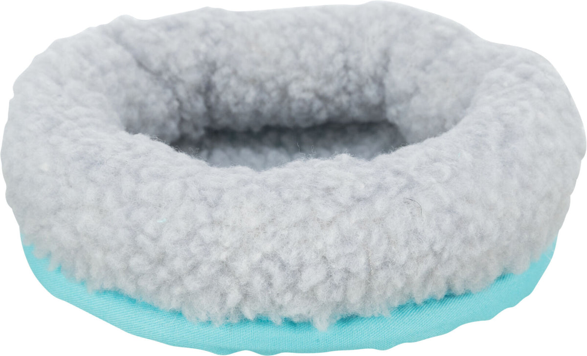Rundes, flauschiges Bett in Hellgrau mit hellblauem Rand.