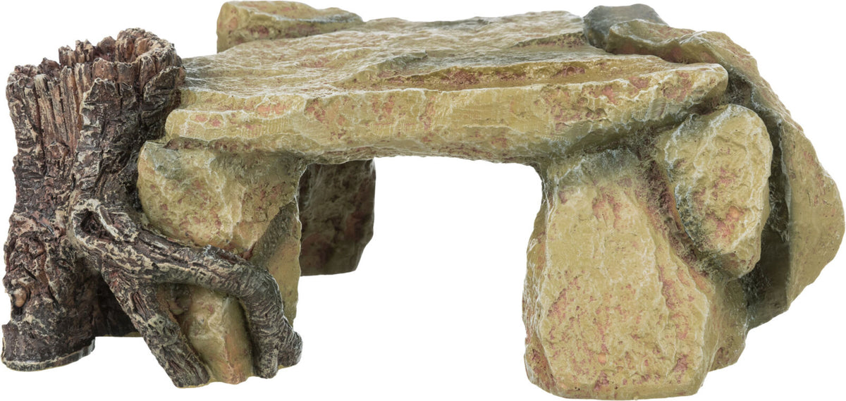 Ein künstlicher, naturgetreu gestalteter Felsen und Holzstück in verschiedenen Brauntönen, geeignet als Dekoration.