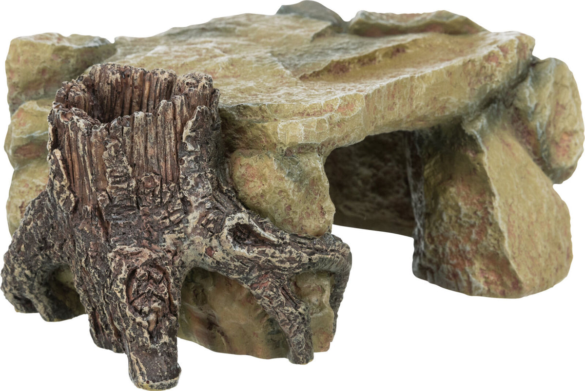 Dekorationselement aus Kunstharz in Form eines Baumstumpfs und Felsen, braun und beige, mit Höhle darunter.