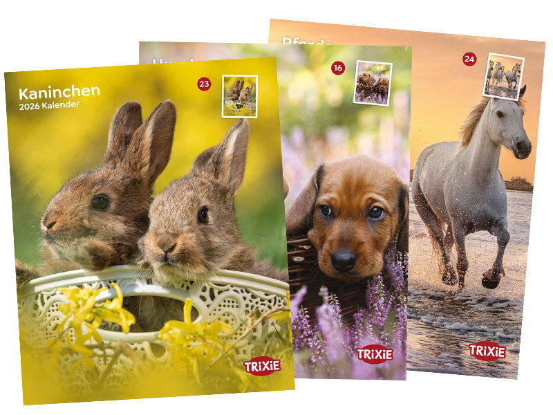 Drei TRIXIE-Kalender mit Tiermotiven: Kaninchen, Hundewelpe und Pferd auf den Titelseiten.
