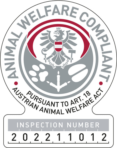 Rundes Siegel mit Adlerwappen, Schriftzug "ANIMAL WELFARE COMPLIANT", Text "PURSUANT TO ART. 18", Nummer 202211012.