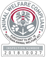 Siegel mit Adler und Symbolen, Text "Animal Welfare Compliant" und "Inspection Number 201810027".