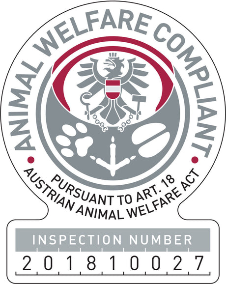 Siegel mit Adler und Symbolen, Text "Animal Welfare Compliant" und "Inspection Number 201810027".