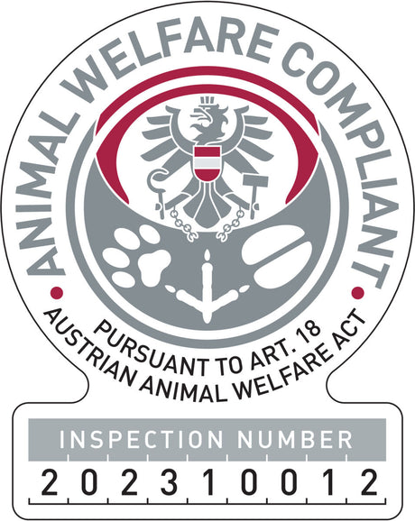 Rundes Siegel mit dem Adler und dem Text "Animal Welfare Compliant" sowie "Inspection Number 202310012".