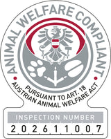 Tierwohl-Konformitätszeichen gemäß österreichischem Tierschutzgesetz Art. 18 mit Inspektionsnummer 202611007.