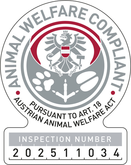Rundes Siegel mit Adler, Tatzenabdrücken und Text "ANIMAL WELFARE COMPLIANT" sowie "INSPECTION NUMBER 202511034".
