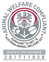 Siegel mit Adler, Tatzen und Schriftzug "Animal Welfare Compliant" sowie Inspektionsnummer 201711038.