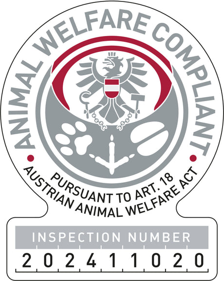 Siegel mit Adler und Tatzenabdrücken, Text "Animal Welfare Compliant, Pursuant to Art. 18 Austrian Animal Welfare Act", Inspektionsnummer 202411020.