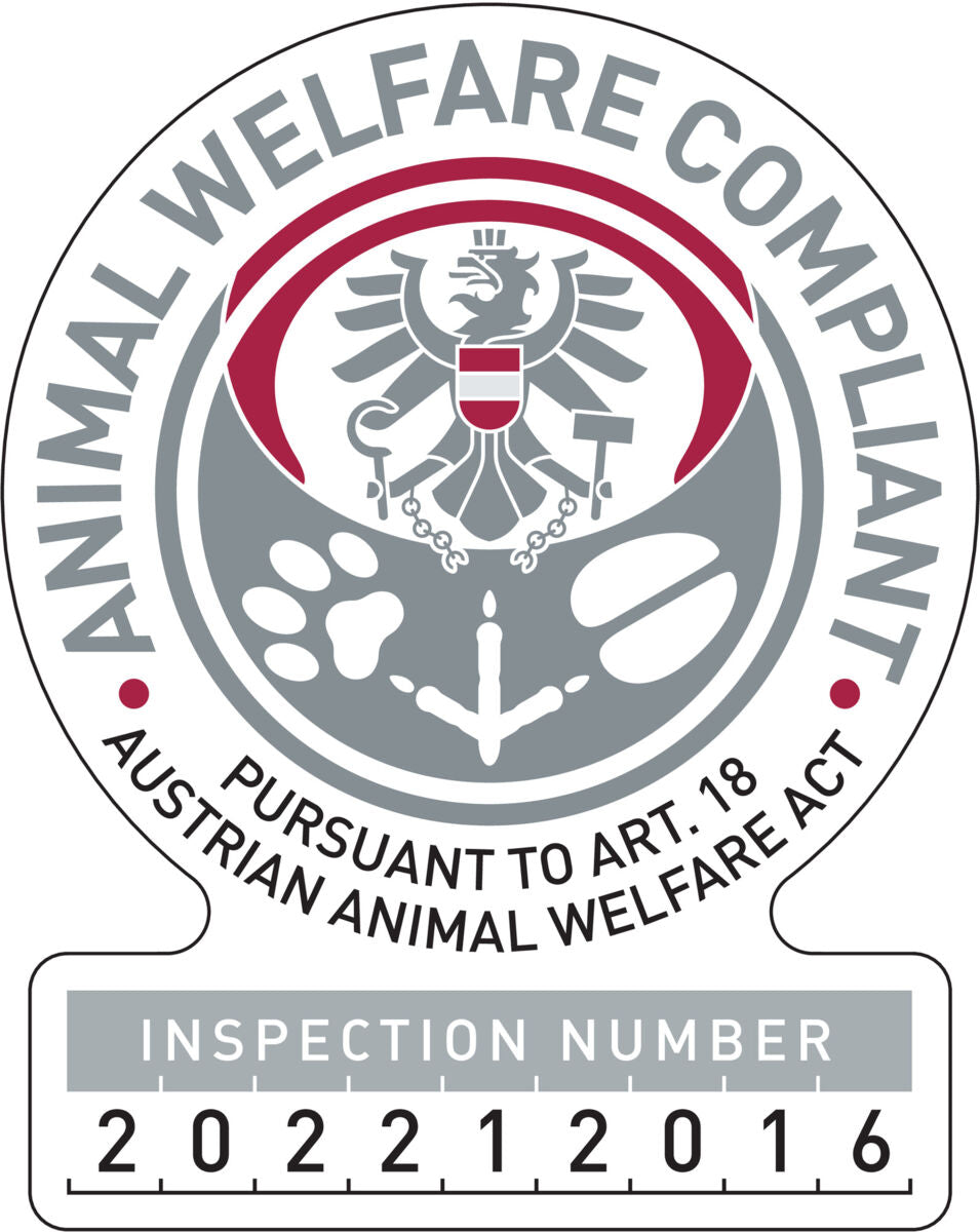 Animal Welfare Compliant Siegel mit Adler, Pfotenabdruck und Inspektionsnummer 202212016, gemäß österreichischem Tierschutzgesetz.