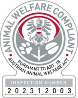 Siegel mit einem Adler und Tierpfoten zeigt den Text "ANIMAL WELFARE COMPLIANT" und "INSPECTION NUMBER 202312003".