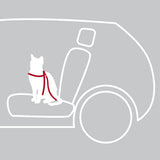 Silhouette einer Katze mit rotem Geschirr auf einem Fahrzeugsitz vor grauem Hintergrund.