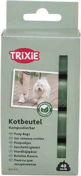 Grüne Verpackung kompostierbarer Kotbeutel mit Markenlogo, Bild eines Hundes, und Übersetzungen in mehreren Sprachen.