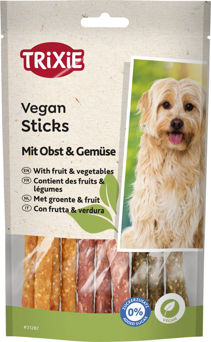 Verpackung von Trixie Vegan Sticks mit Obst und Gemüse, zeigt bunte Sticks und ein Bild eines Hundes, vegan und zuckerfrei.