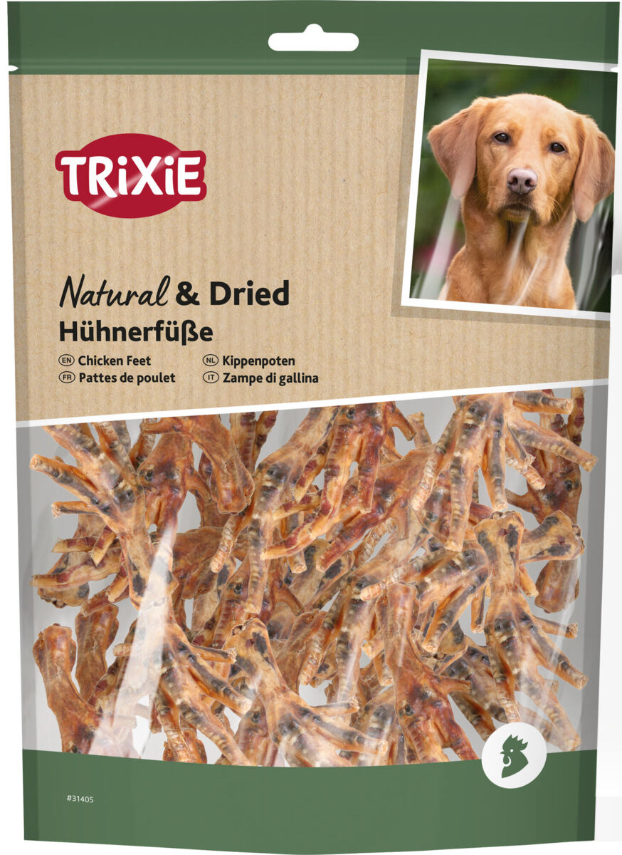 Verpackung von Trixie getrockneten Hühnerfüßen für Hunde mit Abbildung eines Hundes, braune Hühnerfüße sichtbar.