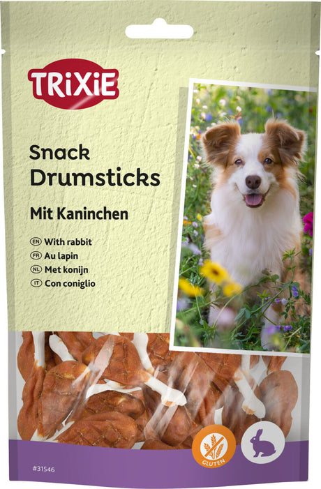 Hundesnack-Verpackung mit Trixie-Logo und Bild eines Hundes, enthält Drumsticks mit Kaninchen, glutenfrei.