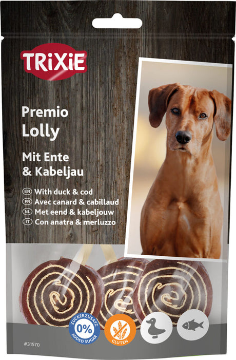 Verpackung von Hunde-Leckerlis der Marke Trixie, Sorte Premio Lolly mit Enten- und Kabeljaugeschmack, abgebildet mit einem Hund.