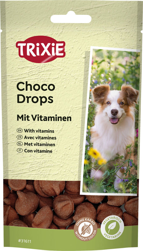 Verpackung von Trixie Choco Drops mit Vitaminen, vegetarisch und ohne Kakao, mit Bild eines Hundes und Schokofarbton.