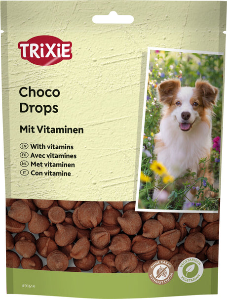 Verpackung von Trixie Choco Drops mit Vitaminen, Abbildung eines Hundes, braune Stückchen, Hinweis "Ohne Kakao, Vegetarisch".