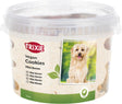 Runde Plastikdose mit durchsichtigem Deckel und Aufkleber "Trixie Vegan Cookies Mini Bones" sowie Hundebild.