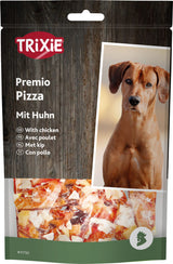 Verpackung für Hundesnacks mit der Aufschrift "TRIXIE Premio Pizza Mit Huhn" und einem Hundebild.