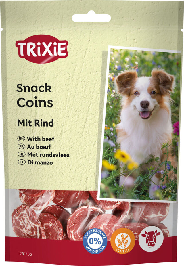 Eine Verpackung mit der Aufschrift "Trixie Snack Coins mit Rind" zeigt Snacks und ein Hundebild, sie ist zuckerfrei und glutenfrei.