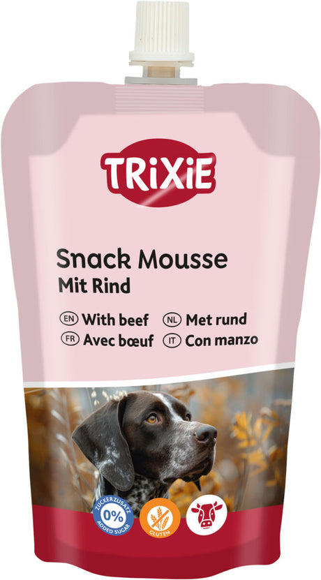 Rosa Verpackung mit Text "Snack Mousse mit Rind", bunter Hund, Symbole für Zuckerzusatz, Gluten und Rindfleisch.