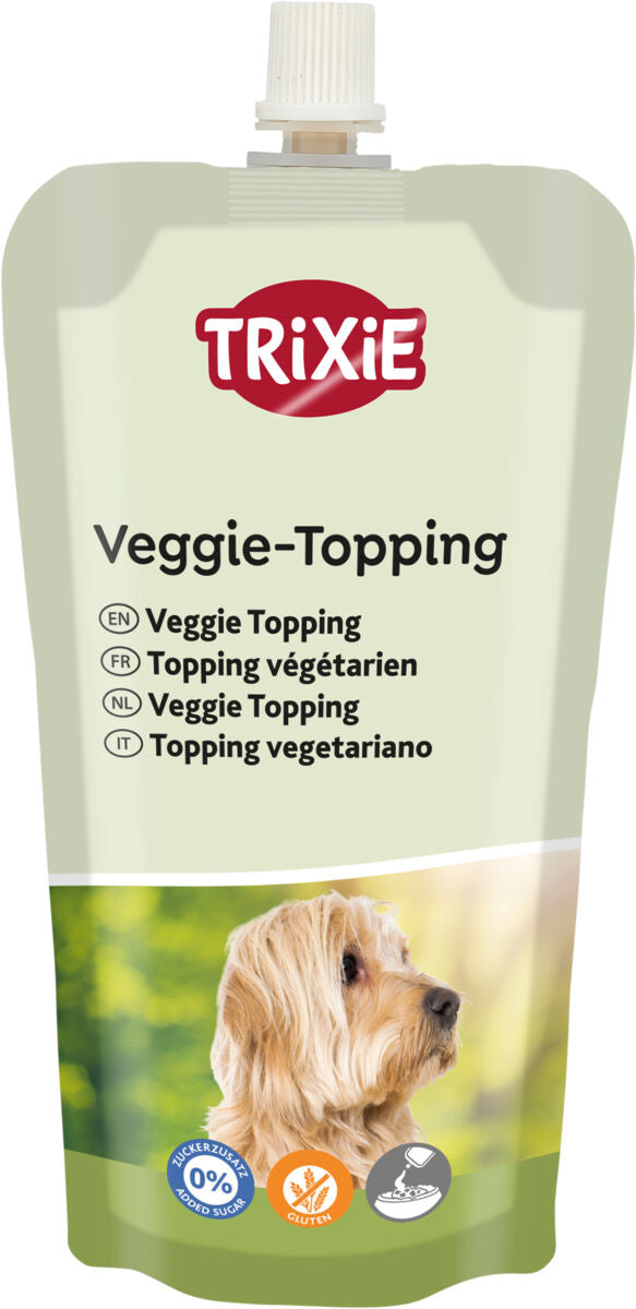Veggie-Topping-Verpackung mit Hundebild, Schriftarten in verschiedenen Sprachen und Symbolen für zuckerfrei und glutenfrei.