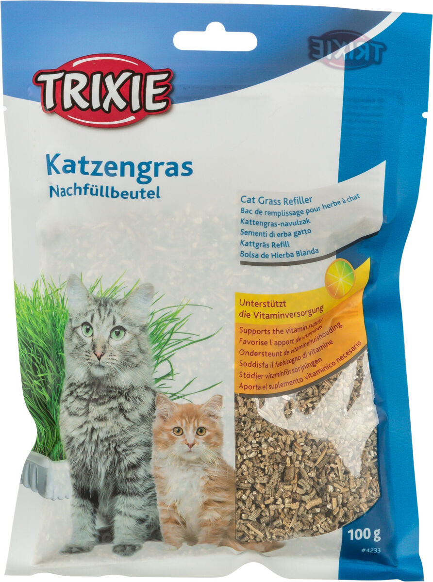 Katzengras-Nachfüllbeutel von Trixie, Verpackung zeigt zwei Katzen, enthält Text zur Unterstützung der Vitaminversorgung, Gewicht 100 g.
