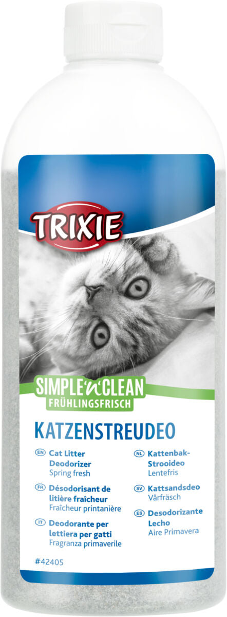 Flasche mit weißem Deckel zeigt ein schwarz-weißes Katzenbild, Aufschrift beschreibt Katzenstreudeo, Frühlingsfrisch.