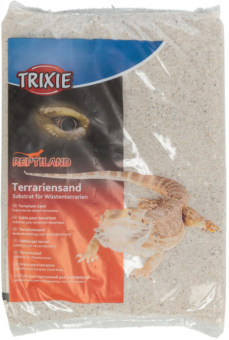 Verpackung von Terrariensand mit einem Reptilienbild und mehrsprachiger Beschriftung, Markenlogo oben links.