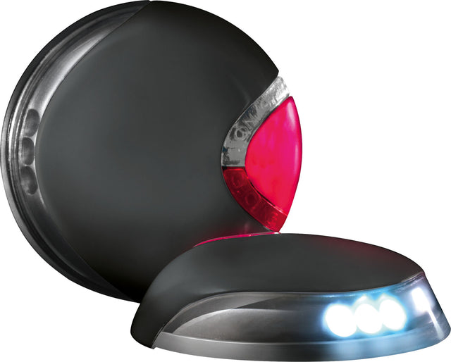 Rundes, dunkles Gehäuse mit leuchtend roten und weißen LED-Lichtern, futuristisches und kompaktes Design.