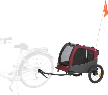 Roter Fahrradanhänger mit zwei Rädern, schwarzer Netzabdeckung und orangefarbener Fahne.