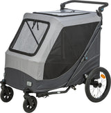 Fahrradanhänger in Grau und Schwarz mit vier Rädern und Netzfenstern, geeignet für den Transport.