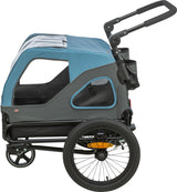 Grauer Fahrradanhänger mit blauem Verdeck, transparentem Dach mit schwarzen Griffen, zwei großen Rädern hinten und kleinem Vorderrad.