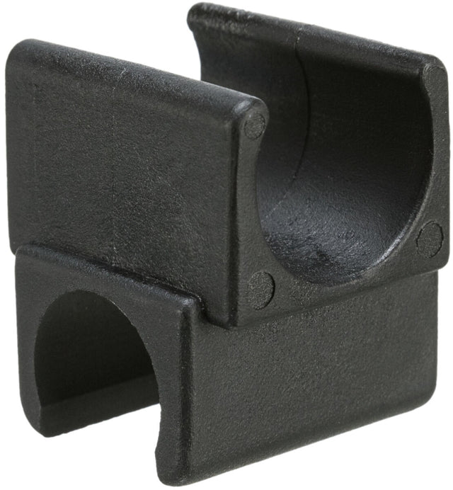 Schwarze, quadratische Klemme mit gebogenen Aussparungen und strukturiertem Finish, aus Kunststoff.