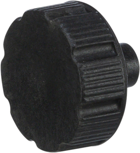 Schwarzer gerippter Drehknopf in runder Form mit kurzem Schaftansatz.