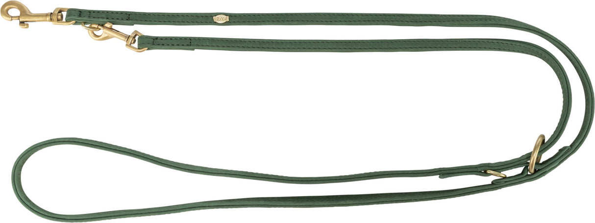 Grüne Hundeleine aus Leder mit goldfarbenem Karabinerhaken und D-Ring; Marke "Trixie" sichtbar.