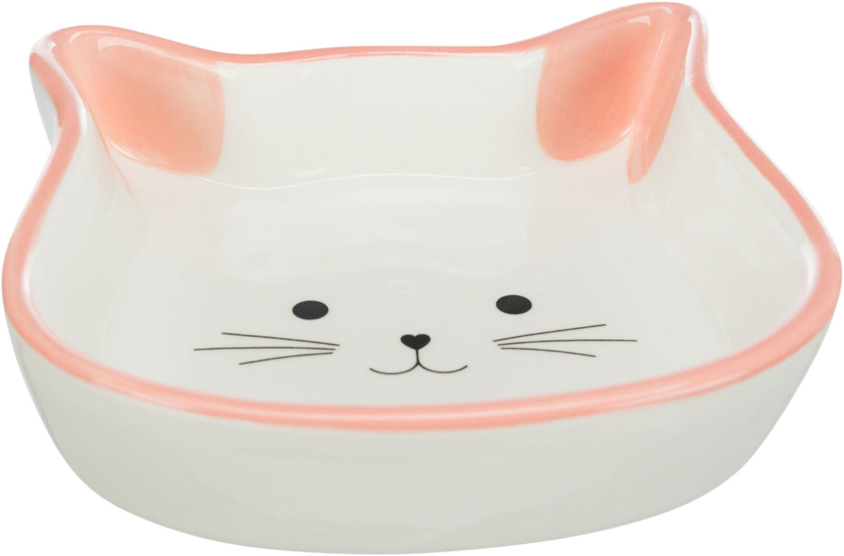 Keramikschale in Katzenkopfform mit rosa Rand und Katzengesicht auf dem Boden, schlichtes Design.