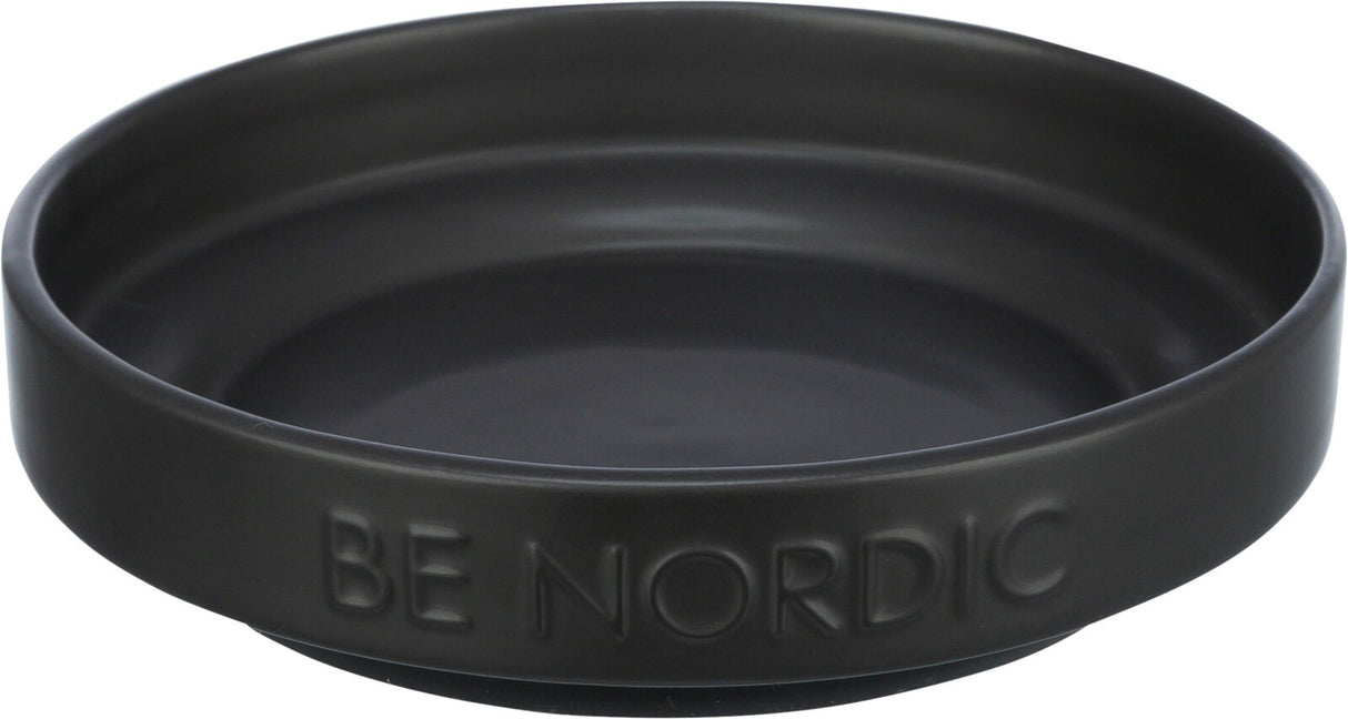 Eine schwarze, runde Schale mit eingeprägtem Text "BE NORDIC" auf der Außenseite.