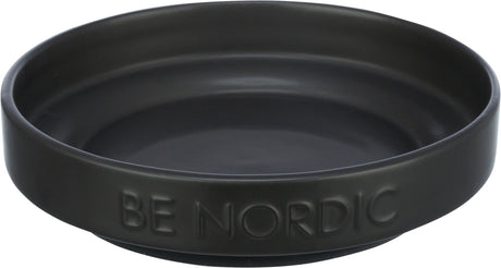 Eine schwarze, runde Schale mit eingeprägtem Text "BE NORDIC" auf der Außenseite.