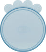 Runder, blauer Deckel mit Pfotenform an der Oberseite und dem Wort "TRIXIE" im Zentrum.