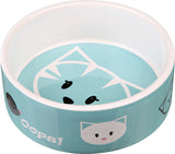 Hellblaue Schüssel mit Katzenmotiven und dem weißen Schriftzug "Oops!" auf der Außenseite.