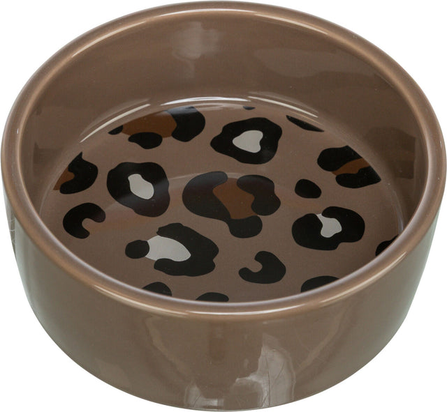 Braune Schale mit einem Leopardenmuster im Inneren, das schwarze und braune Flecken aufweist.