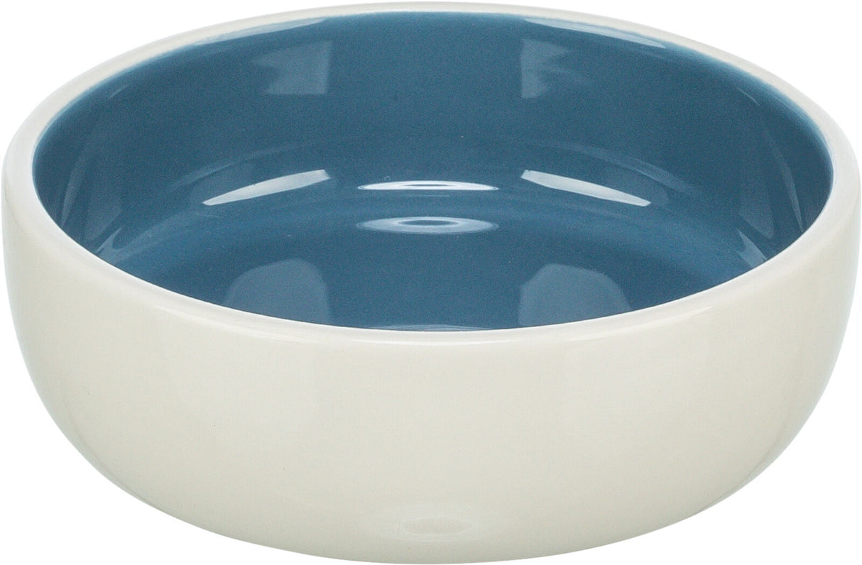 Keramikschale mit weißem Äußeren und blauer Innenseite, runde Form, glänzende Oberfläche.